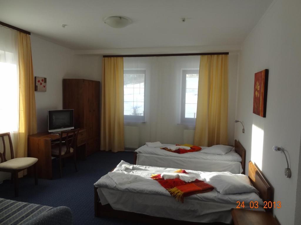 Alpenhof Pansion Hotel Szlavszke Szoba fotó